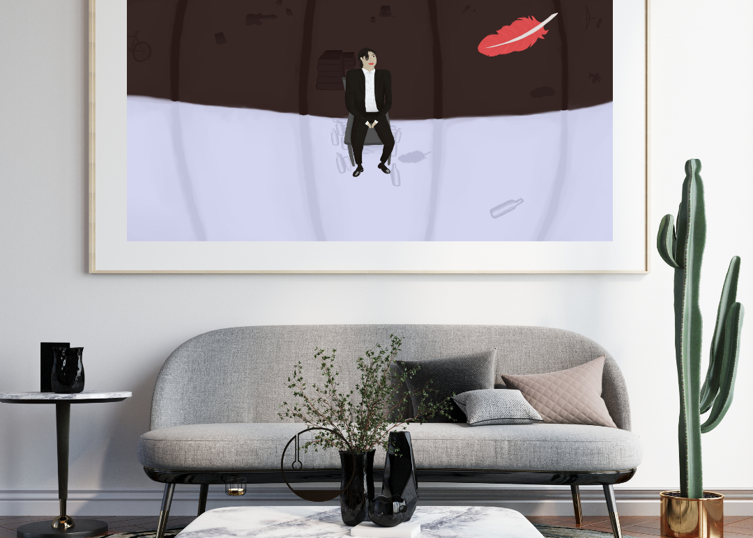 Framed artwork above a gray sofa in a living room setting