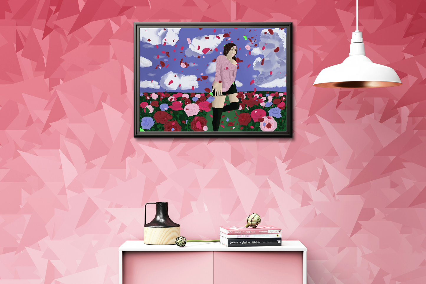 Framed artwork of a woman in a field of flowers on a pink wall with a white cabinet below.